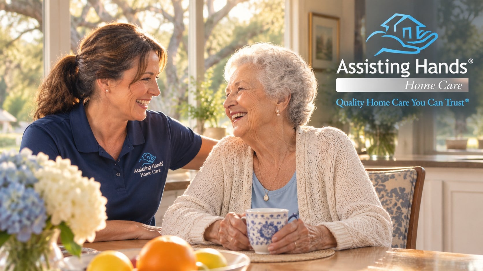 In-home senior care in Walnut Creek, CA Assisting Hands caregiver sharing a warm moment with a senior woman in her Walnut Creek, CA home